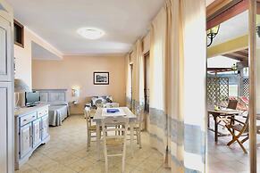 Residence with private beach in Bosa Marina