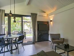 Modern Chalet With air Conditioning, on a Holiday Park at 12 km. From 