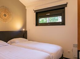 Modern Chalet With air Conditioning, on a Holiday Park at 12 km. From 