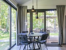 Modern Chalet With air Conditioning, on a Holiday Park at 12 km. From