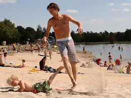 Modern Chalet With air Conditioning, on a Holiday Park at 12 km. From