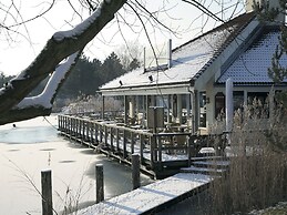 Restyled, Waterfront Bungalow With Rowing Boat, in a Holiday Park