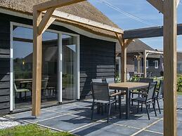 Thatched Villa in a Holiday Park