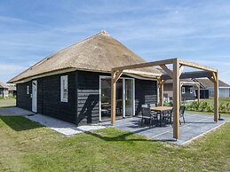 Thatched Villa in a Holiday Park