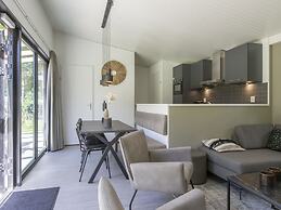 Nice Chalet With air Conditioning, in a Holiday Park at 12 km. From Ei