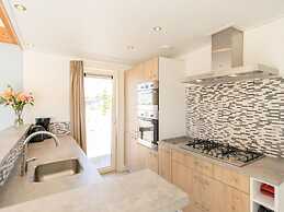 Nice Lodge With two Bathrooms, on a Holiday Park at 1.5 km. From the B