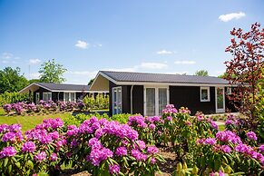 Chalet in Netherlands by Scenic Pond