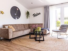 Modern Chalet on the Water in the Brabant Kempen