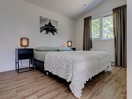 Modern Chalet on the Pond in a Holiday Park