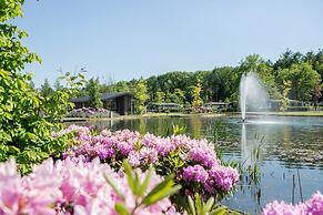 Modern Chalet on the Pond in a Holiday Park