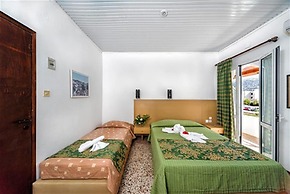 HARMONY HOTEL AND STUDIOS