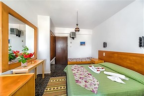 HARMONY HOTEL AND STUDIOS