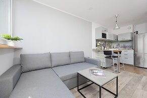 Al. Jana Pawła II Apartment by Renters