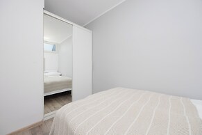 Al. Jana Pawła II Apartment by Renters