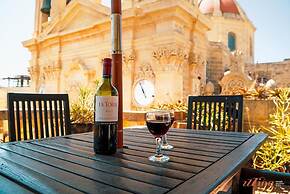 A Pretty Duplex Apartment in a Gozo Village Square