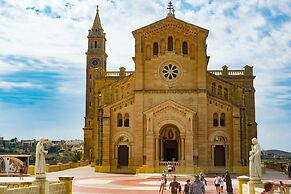 A Pretty Duplex Apartment in a Gozo Village Square