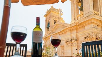 A Pretty Duplex Apartment in a Gozo Village Square