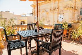 A Pretty Duplex Apartment in a Gozo Village Square