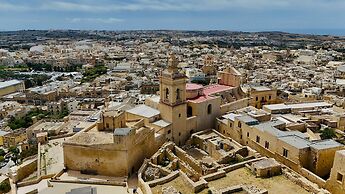 A Pretty Duplex Apartment in a Gozo Village Square