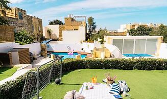 A Stunning Gozo Farmhouse With a Large Pool
