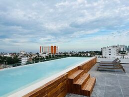 Serene Stylish Stay Roof Pool and Lounge