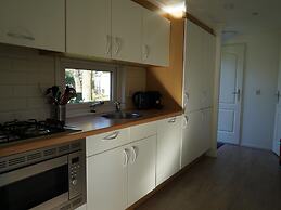 Nice Chalet in a Holiday Park, Adjacent to the Hoge Veluwe National Pa