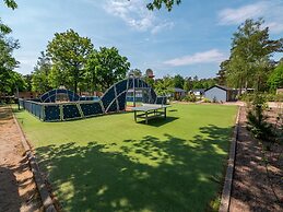 Nice Chalet in a Holiday Park, Adjacent to the Hoge Veluwe National Pa