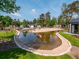 Nice Chalet in a Holiday Park, Adjacent to the Hoge Veluwe National Pa