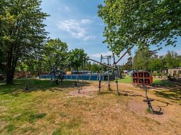 Nice Chalet in a Holiday Park, Adjacent to the Hoge Veluwe National Pa