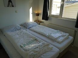 Nice Chalet in a Holiday Park, Adjacent to the Hoge Veluwe National Pa