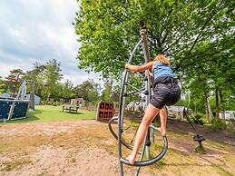 Nice Chalet in a Holiday Park, Adjacent to the Hoge Veluwe National Pa