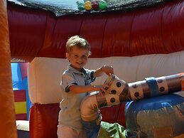 Comfortable Chalet With Microwave, on a Holiday Park 1 km. From the Be