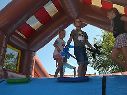 Comfortable Chalet With Microwave, on a Holiday Park 1 km. From the Be