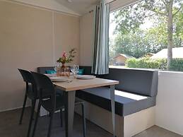 Comfortable Chalet With Microwave, on a Holiday Park 1 km. From the Be