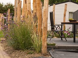 Comfortable Chalet With Microwave, on a Holiday Park 1 km. From the Be