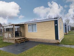 Comfortable Chalet With Microwave, on a Holiday Park 1 km. From the Be