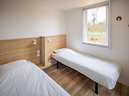 Modern Chalet With air Conditioning, in a Holiday Park, at 1.5 km From