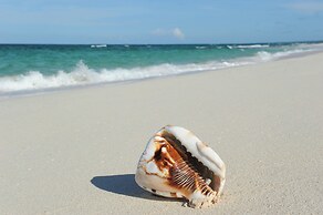 Island Getaway: Charming Cottage Steps From The Beach