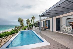 Seven Palms Serenity: Beachfront Oasis