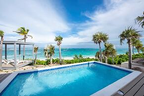Seven Palms Serenity: Beachfront Oasis