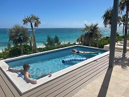 Seven Palms Serenity: Beachfront Oasis