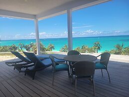 Twin Coves Tranquility: Private Beachfront Estate