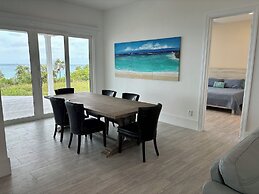 Twin Coves Tranquility: Private Beachfront Estate