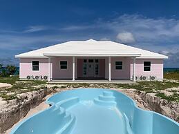 Twin Coves Tranquility: Private Beachfront Estate