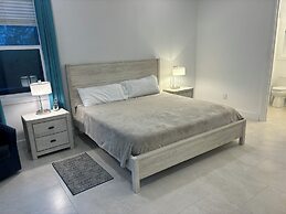 Twin Coves Tranquility: Private Beachfront Estate