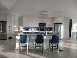 Twin Coves Tranquility: Private Beachfront Estate