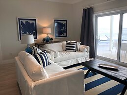 Oceanfront Haven: Elegant Estate With Private Deck