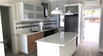 Oceanfront Haven: Elegant Estate With Private Deck