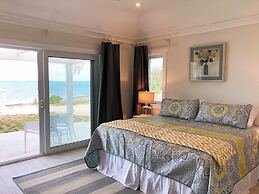 Oceanfront Haven: Elegant Estate With Private Deck