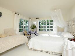 Seaside Sophistication: Elegant Estate With Sunset Views